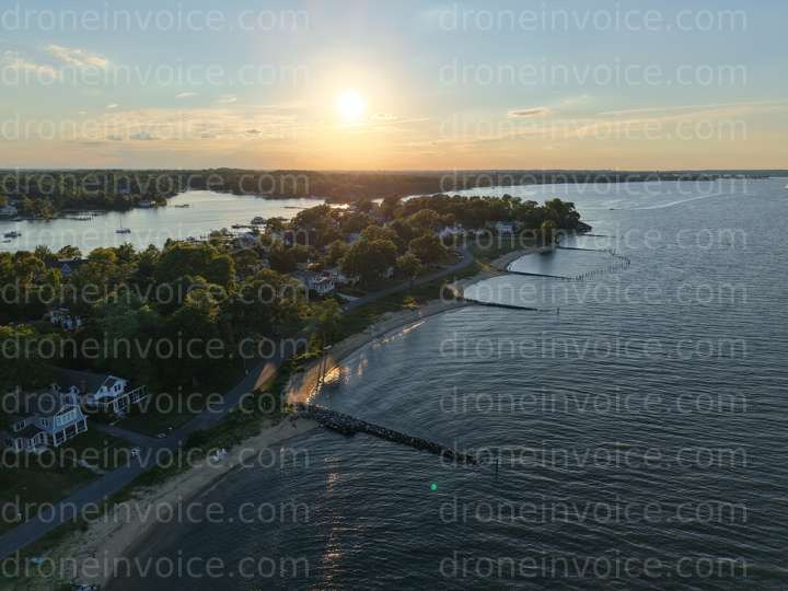 Cover for Waterfront Neighborhood with Setting Sun