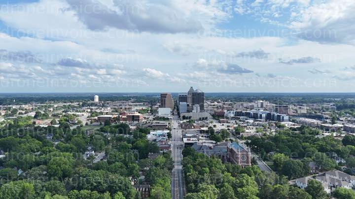 Cover for Southern view of Greensboro skyline