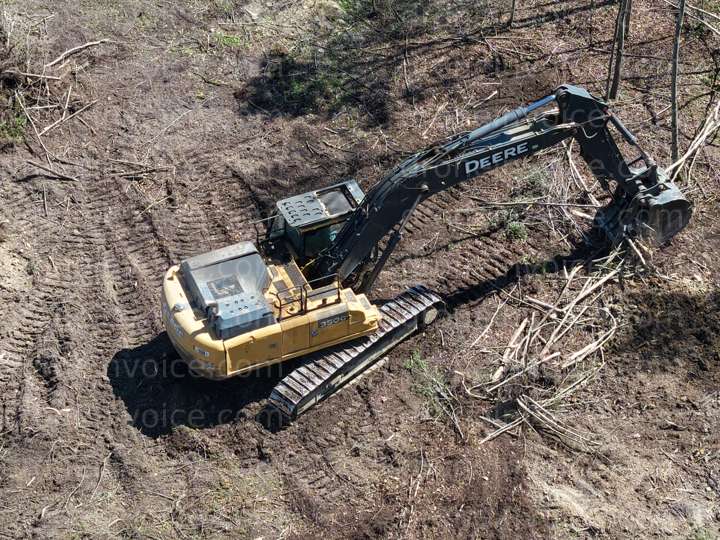 Cover for John Deere excavator clearing trees in Thornburg Virginia area